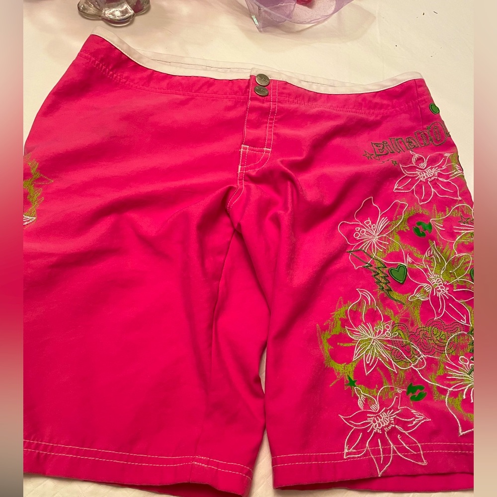 Billabong Size 7 Board shorts in hot pink with embroidered floral accents.